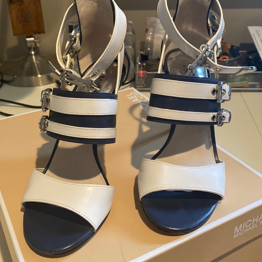 Absolutely stunning pair of Michael Kors sandals. Worn only one time